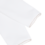 Elegantni asimetrični bijeli blazer s crnim kontrastnim reverima