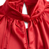 Sofisticirana bijela satenska bluzica s modernim izrezom