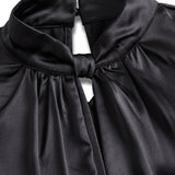 Sofisticirana bijela satenska bluzica s modernim izrezom