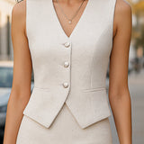 Set s bisernim gumbima: prsluk i maksi suknja