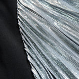 Elegantna haljina s prorezom inspirirana smokingu