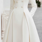 Elegantna dvostruko kopčana kaput-haljina