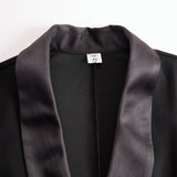 Sofisticirana crna midi haljina s čipkastim detaljima