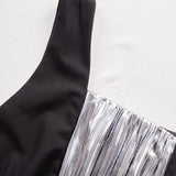 Elegantna jednostrana haljina s metalnim nabranim detaljima