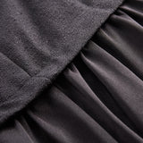 Set s bisernim gumbima: prsluk i maksi suknja