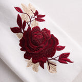 Chic bijeli sako s crvenim ružama