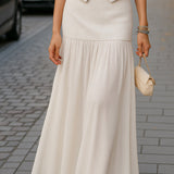 Set s bisernim gumbima: prsluk i maksi suknja